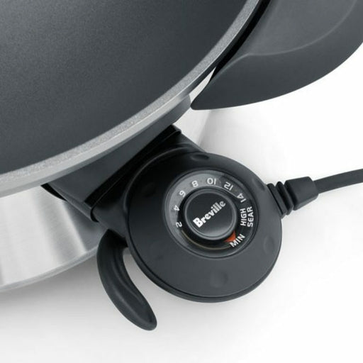 With 15 adjustable heat settings you can choose to simmer or stir fry